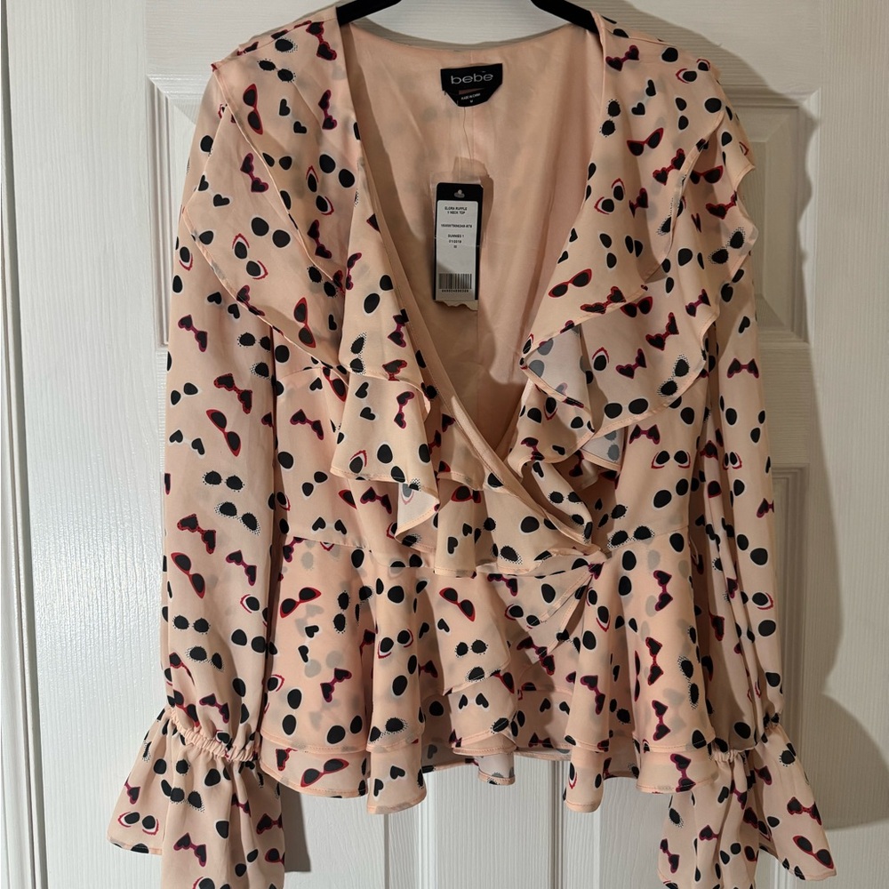 bebe Pink Ruffle V-neck wrap around blouse with sunnies print. NWT. Medium - Picture 2 of 6